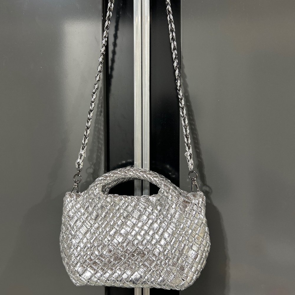 Extremely stylish woven silver designer purse